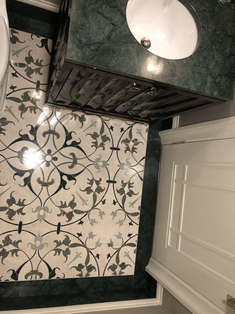 Powder room in Imperial green marble mosaic floor