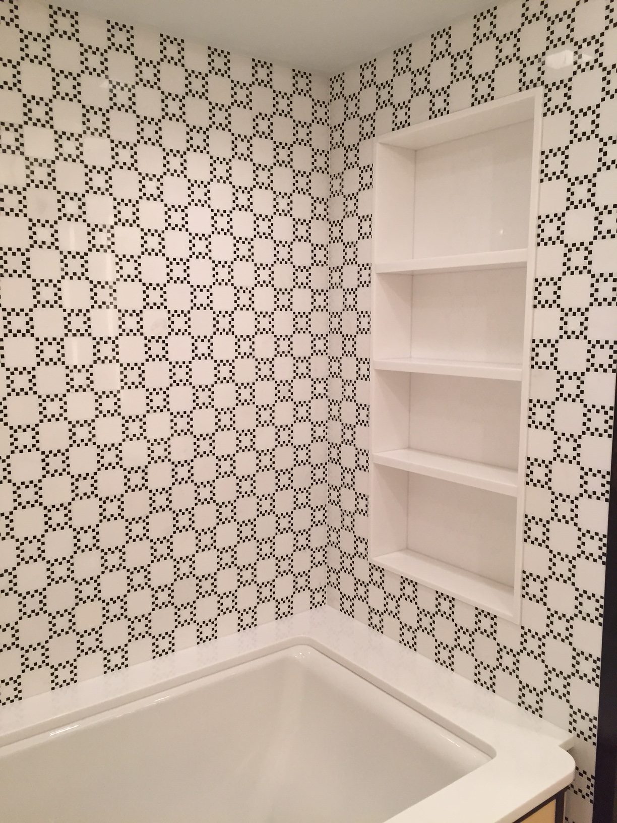 Master bathroom with custom belgium black and white thassos checkerboard mosaic