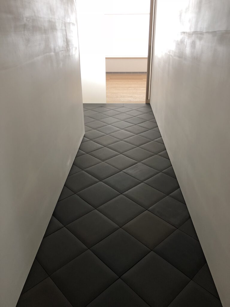 432 Park Ave hallway with custom pillowed tiles